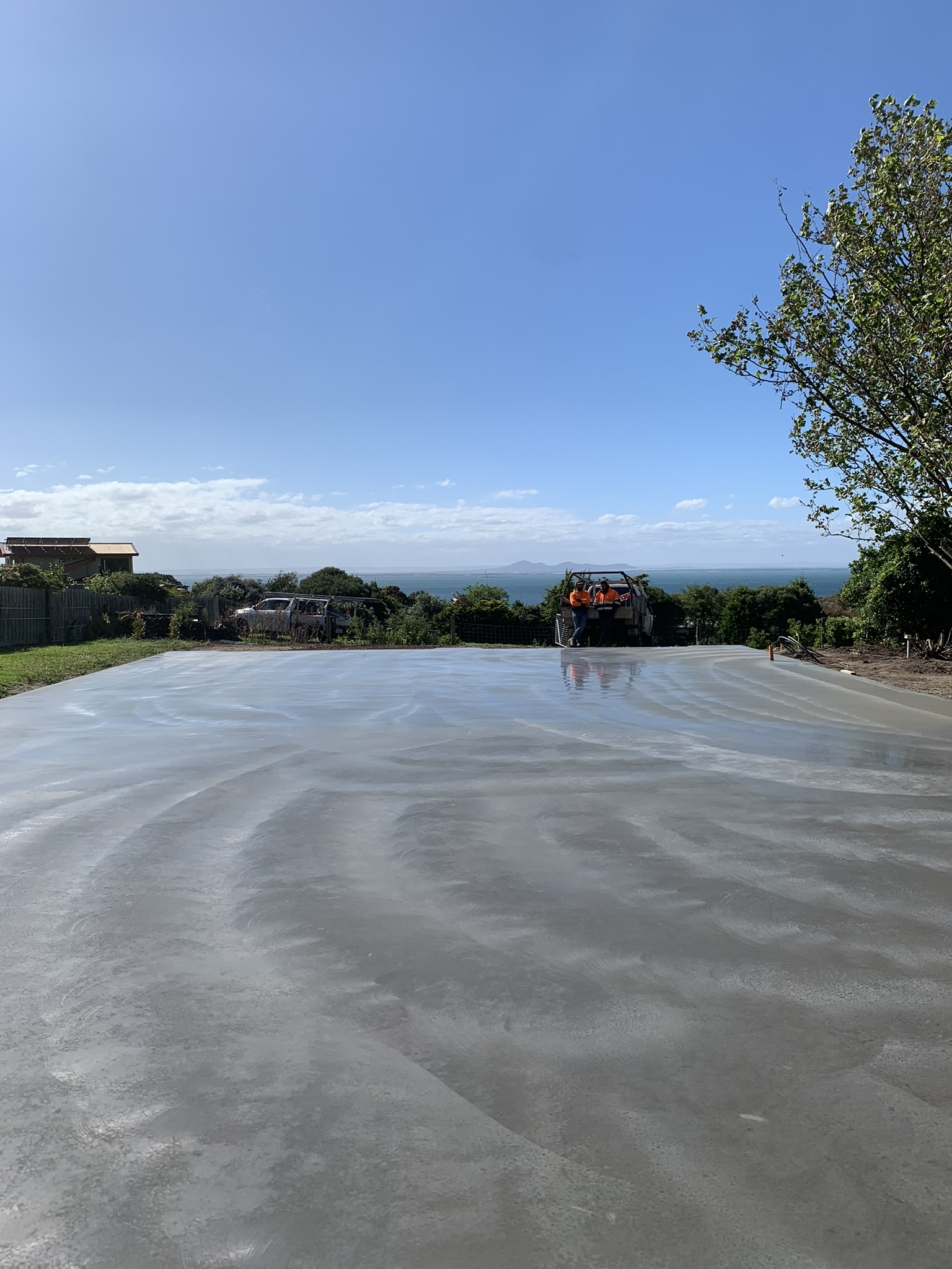 Concreter finishing a residential slab